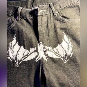 Y2K styled black denim jeans